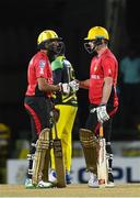 5 August 2016;  Hashim Amla (L) and Colin Munro (R) of Trinbago Knight Riders partnership during the Hero Caribbean Premier League (CPL) – Play-off - Match 33 at Warner Park in Basseterre, St Kitts. Photo by Randy Brooks/Sportsfile
