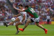 6 August 2016; Tiernan McCann of Tyrone in action against Kevin McLoughlin of Mayo during the GAA Football All-Ireland Senior Championship Quarter-Final match between Mayo and Tyrone at Croke Park in Dublin. Photo by Ray McManus/Sportsfile