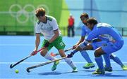 6 August 2016; John Jermyn of Ireland in action against Danish Mujtaba, centre, and Raghunath Vokkaliga of India during their Pool B match at the Olympic Hockey Centre, Deodoro, during the 2016 Rio Summer Olympic Games in Rio de Janeiro, Brazil. Photo by Brendan Moran/Sportsfile