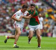 6 August 2016; Ronan O'Neill of Tyrone in action against Brendan Harrison of Mayo during the GAA Football All-Ireland Senior Championship Quarter-Final match between Mayo and Tyrone at Croke Park in Dublin. Photo by Ray McManus/Sportsfile