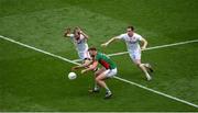 6 August 2016; Aidan O'Shea of Mayo in action against Justin McMahon, left, and Colm Cavanagh of Tyrone during the GAA Football All-Ireland Senior Championship Quarter-Final match between Mayo and Tyrone at Croke Park in Dublin. Photo by Daire Brennan/Sportsfile