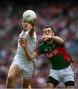 6 August 2016; Connor McAliskey of Tyrone in action against Kevin McLoughlin of Mayo during the GAA Football All-Ireland Senior Championship Quarter-Final match between Mayo and Tyrone at Croke Park in Dublin. Photo by Ray McManus/Sportsfile