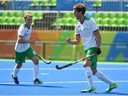 6 August 2016; John Jermyn of Ireland celebrates with team-mate Mitch Darling, left, after scoring his side's first goal against India during their Pool B match at the Olympic Hockey Centre, Deodoro, during the 2016 Rio Summer Olympic Games in Rio de Janeiro, Brazil. Photo by Brendan Moran/Sportsfile