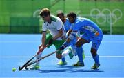 6 August 2016; John Jermyn of Ireland in action against Raghunath Vokkaliga of India during their Pool B match at the Olympic Hockey Centre, Deodoro, during the 2016 Rio Summer Olympic Games in Rio de Janeiro, Brazil. Photo by Brendan Moran/Sportsfile