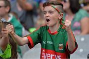 6 August 2016; Young Mayo supporter Mark Jordan, age 11 celebrates Mayo scoring a point during the GAA Football All-Ireland Senior Championship Quarter-Final match between Mayo and Tyrone at Croke Park in Dublin. Photo by Eóin Noonan/Sportsfile