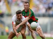 6 August 2016; Tiernan McCann of Tyrone in action against Colm Boyle of Mayo during the GAA Football All-Ireland Senior Championship Quarter-Final match between Mayo and Tyrone at Croke Park in Dublin. Photo by Piaras Ó Mídheach/Sportsfile