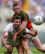 6 August 2016; Tiernan McCann of Tyrone in action against Colm Boyle of Mayo during the GAA Football All-Ireland Senior Championship Quarter-Final match between Mayo and Tyrone at Croke Park in Dublin. Photo by Piaras Ó Mídheach/Sportsfile