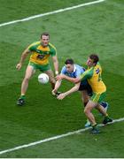 6 August 2016; Paddy Andrews of Dublin in action against Neil McGee, left, and Eamonn McGee of Donegal during the GAA Football All-Ireland Senior Championship Quarter-Final match between Dublin and Donegal at Croke Park in Dublin. Photo by Daire Brennan/Sportsfile