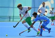 6 August 2016; John Jermyn of Ireland in action against Manpreet Singh of India during their Pool B match at the Olympic Hockey Centre, Deodoro, during the 2016 Rio Summer Olympic Games in Rio de Janeiro, Brazil. Photo by Brendan Moran/Sportsfile