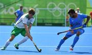 6 August 2016; John Jermyn of Ireland in action against Manpreet Singh of India during their Pool B match at the Olympic Hockey Centre, Deodoro, during the 2016 Rio Summer Olympic Games in Rio de Janeiro, Brazil. Photo by Brendan Moran/Sportsfile