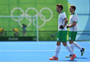 6 August 2016; Chris Cargo, left, and Kyle Good of Ireland leave the pitch after defeat by India during their Pool B match at the Olympic Hockey Centre, Deodoro, during the 2016 Rio Summer Olympic Games in Rio de Janeiro, Brazil. Photo by Brendan Moran/Sportsfile