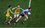 6 August 2016; Brian Fenton of Dublin in action against Ryan McHugh, left, and Martin McElhinney of Donegal during the GAA Football All-Ireland Senior Championship Quarter-Final match between Dublin and Donegal at Croke Park in Dublin. Photo by Daire Brennan/Sportsfile
