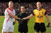 19 September 2010; Cork on-field captain Michael Shields, shakes hands with Down on-field captain Brendan Coulter, in front of referee David Coldrick. GAA Football All-Ireland Senior Championship Final, Down v Cork, Croke Park, Dublin. Picture credit: Ray McManus / SPORTSFILE