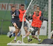 10 October 2010; Republic of Ireland's Robbie Keane, left, in action against team-mates Paul Green, right, and Greg Cunningham during squad training ahead of their EURO 2012 Championship Group B Qualifier against Slovakia on Tuesday. Gannon Park, Malahide, Co. Dublin. Picture credit: David Maher / SPORTSFILE