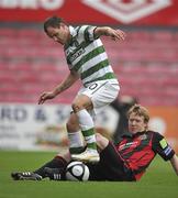 10 October 2010; Anthony Stokes, Glasgow Celtic, in action against Mark O'Reilly, Bohemians. Bohemians v Glasgow Celtic, Dalymount Park, Dublin. Picture credit: David Maher / SPORTSFILE