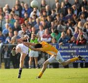 10 October 2010; Tomas Freeman, Magheracloone, in action against Colum Greenan, Clontibret. Monaghan County Senior Football Championship Final, Clontibret v Magheracloone, Inniskeen, Co. Monaghan. Picture credit: Oliver McVeigh / SPORTSFILE