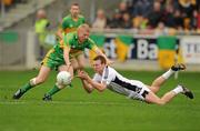 10 October 2010; Lorcan Hiney, Clara, in action against Niall Darby, Rhode. Offaly County Senior Football Championship Final, Rhode v Clara, O'Connor Park, Tullamore, Co. Offaly. Photo by Sportsfile