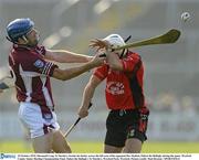 10 October 2010; Diarmuid Lyng, St Martin's, breaks his hurley across the left arm of his opponent Des Mythen, Oulart the Ballagh, during the game. Wexford County Senior Hurling Championship Final, Oulart the Ballagh v St Martin's, Wexford Park, Wexford. Picture credit: Matt Browne / SPORTSFILE