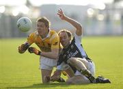 10 October 2010; Anthony Rooney, Clontibret, in action against Francie Doogan, Magheracloone. Monaghan County Senior Football Championship Final, Clontibret v Magheracloone, Inniskeen, Co. Monaghan. Picture credit: Oliver McVeigh / SPORTSFILE
