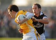 10 October 2010; Conor McManus, Clontibret, in action against Francie Doogan, Magheracloone. Monaghan County Senior Football Championship Final, Clontibret v Magheracloone, Inniskeen, Co. Monaghan. Picture credit: Oliver McVeigh / SPORTSFILE