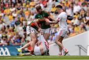 6 August 2016; Diarmuid O'Connor, left, and Aidan O'Shea of Mayo tussles with Ronan McNabb and Cathal McCarron of Tyrone, right, during the GAA Football All-Ireland Senior Championship Quarter-Final match between Mayo and Tyrone at Croke Park in Dublin. Photo by Piaras Ó Mídheach/Sportsfile