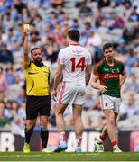 6 August 2016; Refeee David Gough shows a yellow card to Seán Cavanagh of Tyrone and Lee Keegan of Mayo during the GAA Football All-Ireland Senior Championship Quarter-Final match between Mayo and Tyrone at Croke Park in Dublin. Photo by Piaras Ó Mídheach/Sportsfile