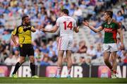 6 August 2016; Refeee David Gough after showing a yellow card to Seán Cavanagh of Tyrone and Lee Keegan of Mayo during the GAA Football All-Ireland Senior Championship Quarter-Final match between Mayo and Tyrone at Croke Park in Dublin. Photo by Piaras Ó Mídheach/Sportsfile