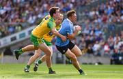 6 August 2016; Paul Flynn of Dublin in action against Eamonn McGee, 4, and Anthony Thompson of Donegal during the GAA Football All-Ireland Senior Championship Quarter-Final match between Dublin and Donegal at Croke Park in Dublin. Photo by Ray McManus/Sportsfile