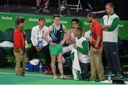 6 August 2016; Kieran Behan of Ireland after suffering a suspected dislocated left knee during the Men's Artistic Gymnastics Qualification in the Rio Olympic Arena, Barra de Tijuca, during the 2016 Rio Summer Olympic Games in Rio de Janeiro, Brazil. Photo by Brendan Moran/Sportsfile