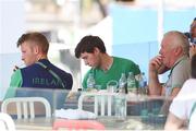 7 August 2016; Gary O'Donovan, left, and Paul O'Donovan, centre, of Ireland wait as their event is delayed in Lagoa Stadium, Copacabana, during the 2016 Rio Summer Olympic Games in Rio de Janeiro, Brazil. Photo by Brendan Moran/Sportsfile