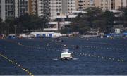 7 August 2016; Race officials inspect the course before rowing was cancelled for the day in Lagoa Stadium, Copacabana, during the 2016 Rio Summer Olympic Games in Rio de Janeiro, Brazil. Photo by Brendan Moran/Sportsfile