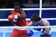 7 August 2016; Thadius Katua of Papua New Guinea, left, in action against Adlan Abdurashidov of Russia during their 60kg bout in the Riocentro Pavillion 6 Arena, Barra da Tijuca, during the 2016 Rio Summer Olympic Games in Rio de Janeiro, Brazil. Photo by Ramsey Cardy/Sportsfile