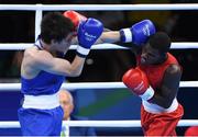 7 August 2016; Thadius Katua of Papua New Guinea, right, in action against Adlan Abdurashidov of Russia during their 60kg bout in the Riocentro Pavillion 6 Arena, Barra da Tijuca, during the 2016 Rio Summer Olympic Games in Rio de Janeiro, Brazil. Photo by Ramsey Cardy/Sportsfile