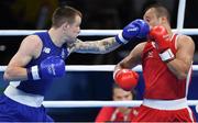 7 August 2016; Steven Donnelly of Ireland, left, in action against Zohir Kedache of Algeria during their Welterweight preliminary round of 32 bout in the Riocentro Pavillion 6 Arena, Barra da Tijuca, during the 2016 Rio Summer Olympic Games in Rio de Janeiro, Brazil. Photo by Ramsey Cardy/Sportsfile