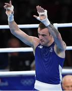 7 August 2016; Steven Donnelly of Ireland celebrates after defeating Zohir Kedache of Algeria in their Welterweight preliminary round of 32 bout in the Riocentro Pavillion 6 Arena, Barra da Tijuca, during the 2016 Rio Summer Olympic Games in Rio de Janeiro, Brazil. Photo by Ramsey Cardy/Sportsfile