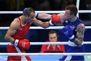 7 August 2016; Steven Donnelly of Ireland, right, in action against Zohir Kedache of Algeria during their Welterweight preliminary round of 32 bout in the Riocentro Pavillion 6 Arena, Barra da Tijuca, during the 2016 Rio Summer Olympic Games in Rio de Janeiro, Brazil. Photo by Ramsey Cardy/Sportsfile