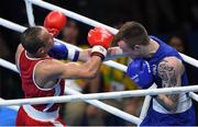 7 August 2016; Steven Donnelly of Ireland, right, in action against Zohir Kedache of Algeria during their Welterweight preliminary round of 32 bout in the Riocentro Pavillion 6 Arena, Barra da Tijuca, during the 2016 Rio Summer Olympic Games in Rio de Janeiro, Brazil. Photo by Ramsey Cardy/Sportsfile