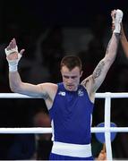 7 August 2016; Steven Donnelly of Ireland is announced victorious over Zohir Kedache of Algeria in their Welterweight preliminary round of 32 bout in the Riocentro Pavillion 6 Arena, Barra da Tijuca, during the 2016 Rio Summer Olympic Games in Rio de Janeiro, Brazil. Photo by Ramsey Cardy/Sportsfile