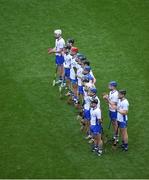 7 August 2016; The Waterford team stand together for a minutes silence for former Kilkenny handballer Michael Duxie Walsh ahead of the GAA Hurling All-Ireland Senior Championship Semi-Final match between Kilkenny and Waterford at Croke Park in Dublin. Photo by Daire Brennan/Sportsfile