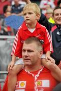 19 September 2010; Former Cork hurler Diarmuid O'Sullivan and his son Cian watch on during the Cork celebtations at the end of the game. GAA Football All-Ireland Senior Championship Final, Down v Cork, Croke Park, Dublin. Picture credit: David Maher / SPORTSFILE
