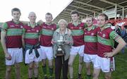 3 October 2010; Patsy Casey, centre, with her seven grandsons Declan Mullan, Colm McGoldrick, Barry McGoldrick, Niall Holly, Ciaran McGoldrick and Sean Leo McGoldrick, who all played for Coleraine Eoghan Rua. Derry County Senior Football Championship Final, Ballinderry v Coleraine, Celtic Park, Derry. Picture credit: Oliver McVeigh / SPORTSFILE