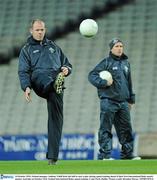 14 October 2010; Ireland manager Anthony Tohill kicks the ball to start a play during squad training ahead of their first International Rules match against Australia on October 23rd. Ireland International Rules squad training, Croke Park, Dublin. Picture credit: Brendan Moran / SPORTSFILE