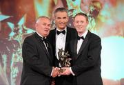 15 October 2010; Colm Cooper, Kerry, is presented with his GAA Football All-Star award by Uachtarán Chumann Lúthchleas Gael Criostóir Ó Cuana and Jeroen Hoencamp, CEO, Vodafone Ireland, during the 2010 GAA All-Stars Awards, sponsored by Vodafone. Citywest Hotel & Conference Centre, Saggart, Co. Dublin. Picture credit: Brendan Moran / SPORTSFILE