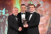 15 October 2010; Paddy Keenan, Louth, is presented with his GAA Football All-Star award by Uachtarán Chumann Lúthchleas Gael Criostóir Ó Cuana and Jeroen Hoencamp, CEO, Vodafone Ireland, during the 2010 GAA All-Stars Awards, sponsored by Vodafone. Citywest Hotel & Conference Centre, Saggart, Co. Dublin. Picture credit: Brendan Moran / SPORTSFILE