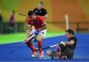 7 August 2016; Mark Gleghorne of Great Britain in action against Shea McAleese of New Zealand during their Pool B match at the Olympic Hockey Centre, Deodoro, during the 2016 Rio Summer Olympic Games in Rio de Janeiro, Brazil. Photo by Brendan Moran/Sportsfile