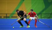 7 August 2016; Bradley Shaw of New Zealand in action against Simon Mantell of Great Britain during their Pool B match at the Olympic Hockey Centre, Deodoro, during the 2016 Rio Summer Olympic Games in Rio de Janeiro, Brazil. Photo by Brendan Moran/Sportsfile