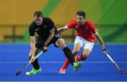 7 August 2016; Bradley Shaw of New Zealand in action against Simon Mantell of Great Britain during their Pool B match at the Olympic Hockey Centre, Deodoro, during the 2016 Rio Summer Olympic Games in Rio de Janeiro, Brazil. Photo by Brendan Moran/Sportsfile