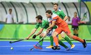 7 August 2016; Jonathan Bell of Ireland in action against Bob de Voogd of Netherlands during their Pool B match at the Olympic Hockey Centre, Deodoro, during the 2016 Rio Summer Olympic Games in Rio de Janeiro, Brazil. Picture by Brendan Moran/Sportsfile