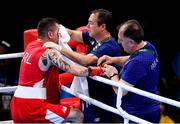 7 August 2016; Eddie Bolger wipes the face of David Oliver Joyce of Ireland following at the Lightweight preliminary round of 32 bout in the Riocentro Pavillion 6 Arena, Barra da Tijuca, during the 2016 Rio Summer Olympic Games in Rio de Janeiro, Brazil. Photo by Ramsey Cardy/Sportsfile
