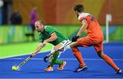 7 August 2016; Peter Caruth of Ireland in action against Hidde Turkstra of Netherlands during their Pool B match at the Olympic Hockey Centre, Deodoro, during the 2016 Rio Summer Olympic Games in Rio de Janeiro, Brazil. Picture by Brendan Moran/Sportsfile